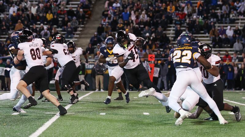 Telly Johnson looks for yards in NIU's loss at Toledo on Wednesday, Nov. 5, 2025.