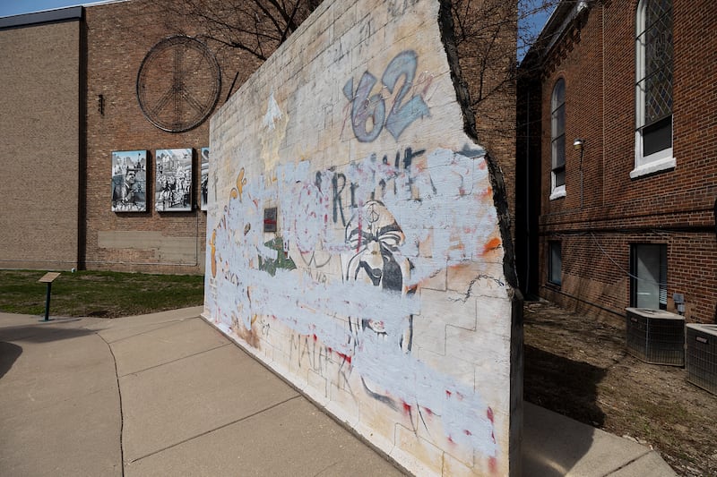 Vandals recently spray painted graffiti on a Berlin Wall replica at Peace Park in Dixon.