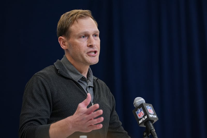 Chicago Bears head coach Ben Johnson speaks during a press conference at the NFL football scouting combine in Indianapolis, Tuesday, Feb. 25, 2025. (AP Photo/Michael Conroy)