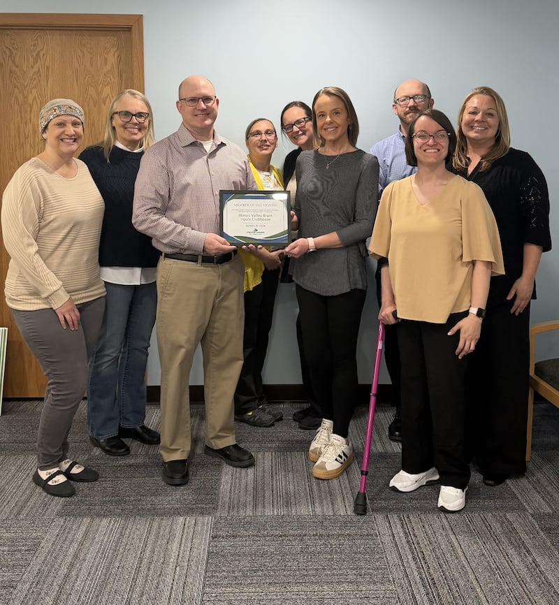 Members and Chamber representatives pose for a photo celebrating Illinois Valley Brain Injury Clubhouse as the March 2026 Member of the Month. (from left): Carri Pedelty, Chamber ambassador and Illinois Valley Brain Injury Clubhouse; Lori Welch, Illinois Valley Brain Injury Clubhouse; Ben Hiltabrand, Chamber president; Jessica Stayton, Chamber ambassador; Laura Mattson, Chamber ambassador; Tonya Carter, Illinois Valley Brain Injury Clubhouse; Derek Barichello, Chamber director; Kristina McCormick, Illinois Valley Brain Injury Clubhouse; and Lana Welch, Illinois Valley Brain Injury Clubhouse.