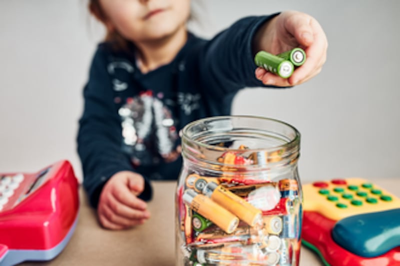 Proper battery storage and preparation — including separating alkaline from rechargeable batteries and covering terminals with tape — reduces fire risk before recycling.
