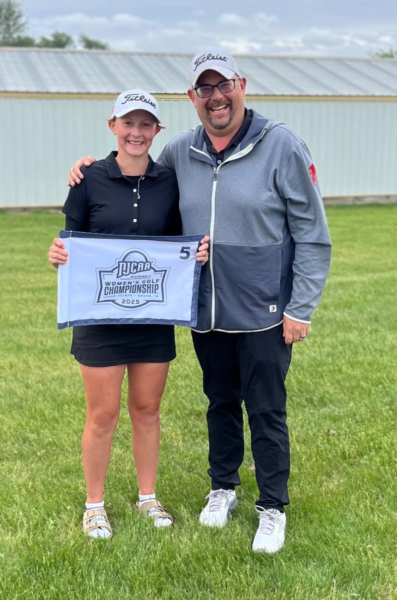 Katie Drew, left, and Sauk Valley Community College golf coach C.J. Wade are pictured after Drew placed fifth at the NJCAA DII Women's National Championship tournament at Cedar Pointe Golf Course in Boone, Iowa, on Friday, May 16, 2025. Drew earned First Team All-American.