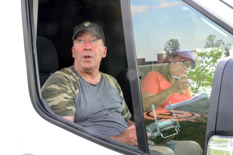 SHARK President Steve Hindi (left) and Elgin resident Ellen Svehla (right) keep track of how many times animals are being used in events at a rodeo south of Rochelle on Sunday, May 24, 2026.