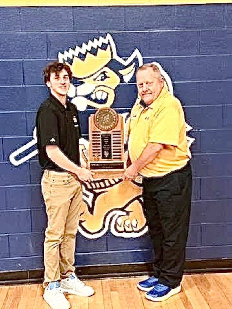 Head coach Cayden Hansen (left) and assistant Kenny Wilcoxen have teamed up to lead the Princeton Logan 8th grade boys basketball team to the SRC championship, a 20-4 record and the No. 1 see for the Class 3A Kewanee Regional.