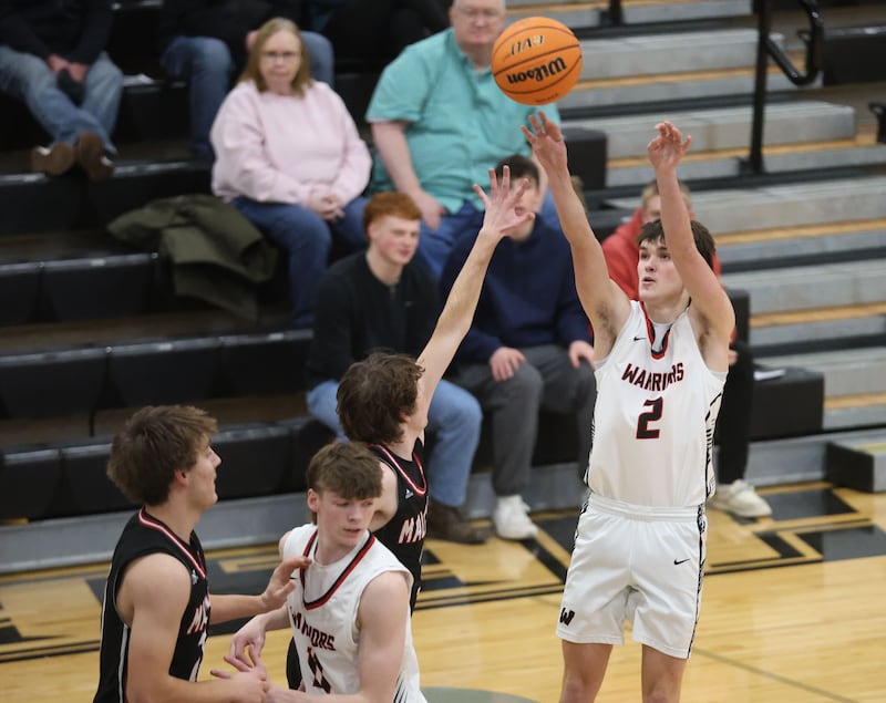 Woodland's Nolan Prince lets go of a jump shot against Henry-Senachwine during the Tri-County Conference Tournament on Monday, Jan. 26, 2026 at Putnam County High School