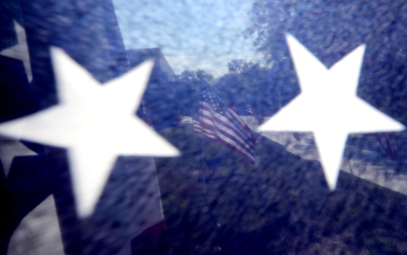American flags, put up by True Patriots Care, surround McHenry Township Fire Protection District Station 2 on Johnsburg Road in Johnsburg on Thursday, Sept. 11, 2025. The Flags of Honor is on  display at Station 2 through September 15. This exhibit honors the 343 brave firefighters who lost their lives during the tragic events of September 11, 2001, with each flag symbolizing their courage and sacrifice.