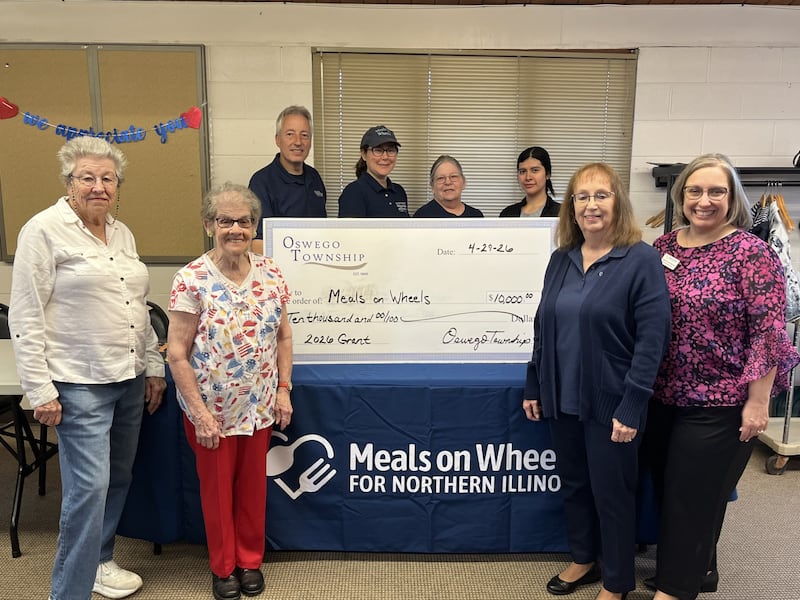 Pictured in back row (from left) Oswego Township Supervisor Brian LeClercq, Meals on Wheels outreach coordinator Elizabeth Bowman, Meals on Wheels nutrition director Louise Maritato, Meals on Wheels food service aide Jessica Lazarit. Front row (from left) are Meals on Wheels food service aide Lois Konicek, Meals on Wheels chef Kerin Harris, Oswego Township Trustee Judy Bush and Meals on Wheels CEO Andrea Proulx Buinicki seen recently as Oswego Township makes a donation to the nonprofit organization.