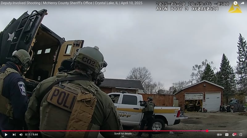 McHenry County Sheriff's Office deputies on April 10, 2025, outside a home in rural Crystal Lake. A resident there, Darrick Lawrence, 46, was shot and killed by police following a 2 1/2 hour standoff.