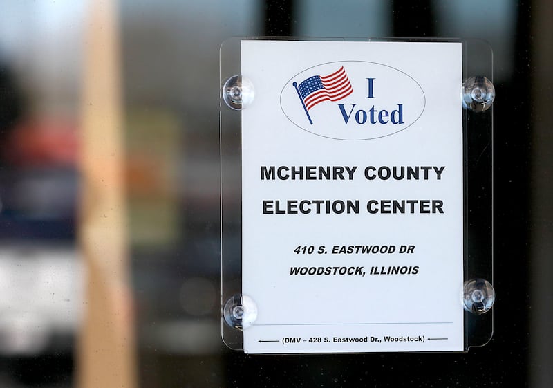 A sign hangs on the door of the McHenry County Election Center on Tuesday, March, 17, 2026, in Woodstock. The Election Center serves as a universal polling place, accessible to all McHenry County voters.