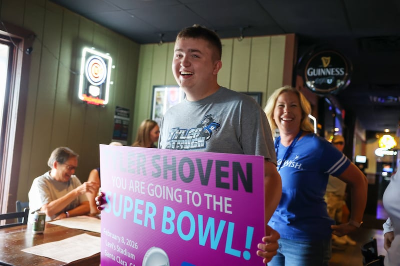 Tyler Shoven, of Clifton, is surprised with a trip to the Super Bowl by Make-A-Wish Illinois volunteers Lisa Holt, right, and Gina Cordes last week as his family dined at Sammy's in Bourbonnais.
The 2025 Clifton Central graduate will celebrate the third anniversary of his heart transplant in February along with traveling to California for the big game.
