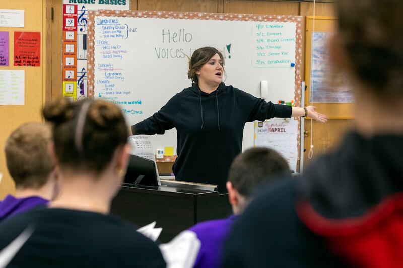 Erin Rogers leads her choir class at Dixon High School Thursday, April 10, 2025.