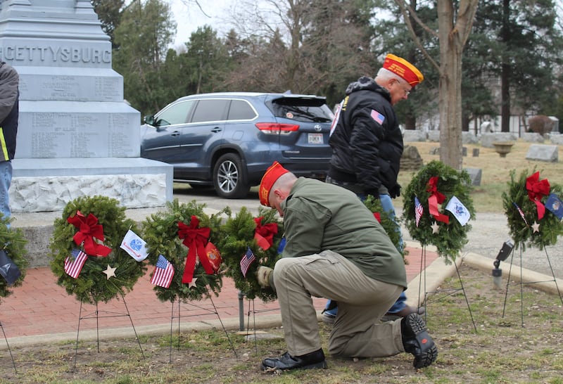 American Legion members place wreaths representing the branches of the U.S. military at Union Cemetery on Dec. 14, 2024, in Crystal Lake during the Wreaths Across America ceremony.