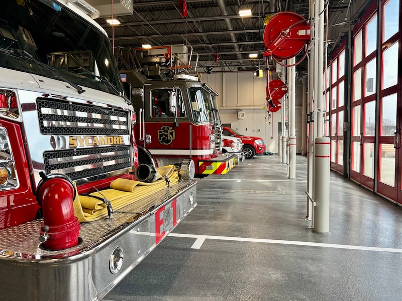 Fire trucks and emergency vehicles sit in the new garage on Tuesday, Feb. 17, 2026, at the Sycamore Fire Department's new fire station, 1351 S. Prairie Drive. The station will replace the aging building at 535 DeKalb Ave. The department held a ceremony Tuesday to mark the opening.