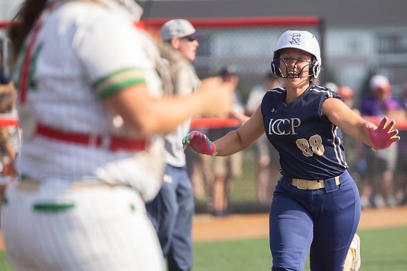 IC Catholic’s Kelly Cahill celebrates as she breaks a tie in the 5th inning against Seneca Thursday, June 4, 2026, in the Class 2A softball semifinal in Peoria.