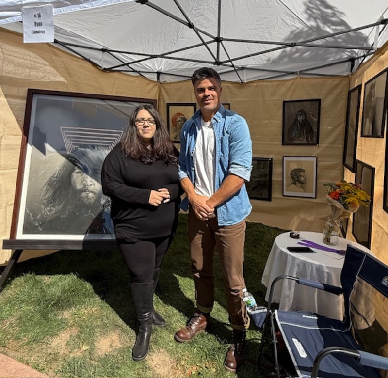 Ryan Jandrey, the Charles Kested Best of Show winner, is pictured with Judge Danielle Koenig the 2025 Grand Detour Arts Festival in Grand Detour.