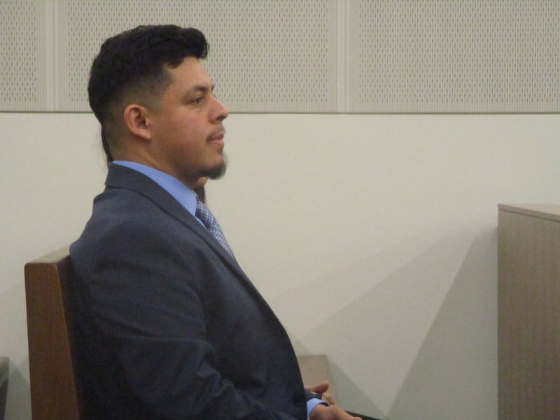 Joliet Councilman Juan Moreno listens Monday at a hearing in a case that will determine whether he remains on the City Council. Sept. 22, 2025
