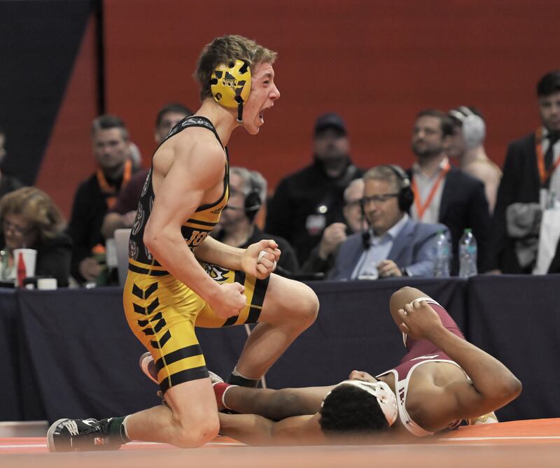 Joliet West’s Carson Weber reacts after defeating Lockport’s Justin Wardlow in the Class 3A 150-pound final at the IHSA boys state wrestling championships at the State Farm Center in Champaign on Saturday, Feb. 22, 2025.