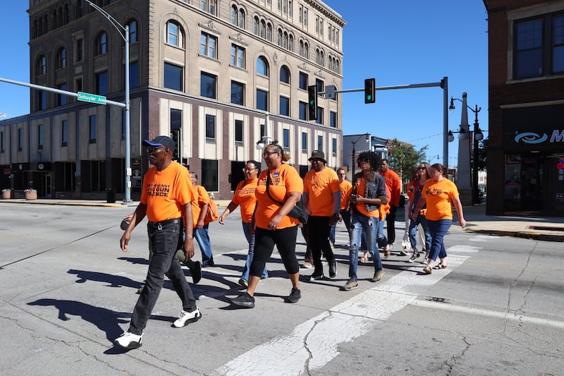 Leaders with local organizations cross Court Street as they participate in a Peace Walk around downtown Kankakee as part of Cities United's “Walk It Out to End Community Violence” national day of action on Monday, June 15, 2026.