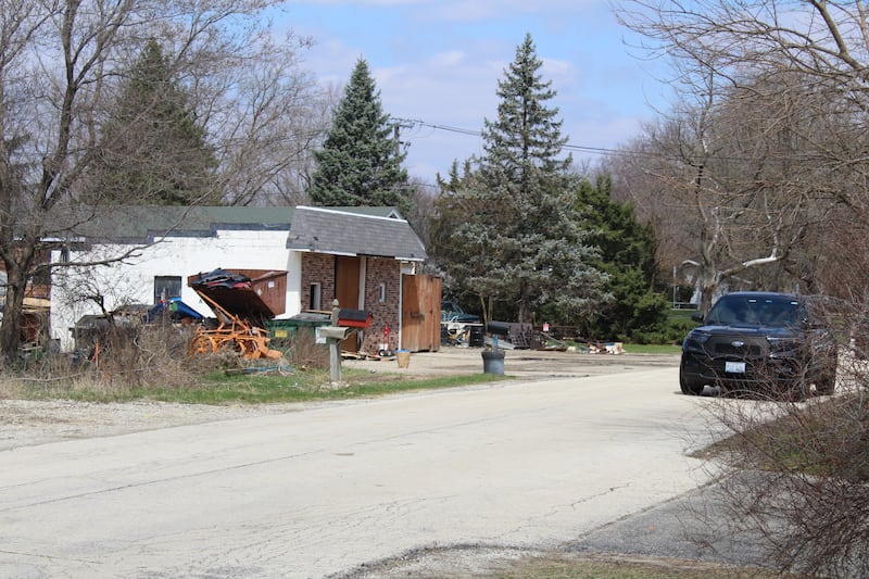 Police continue to have a portion of the 300 block of Briarwood Road near Crystal Lake blocked off to traffic on April 11, 2025.