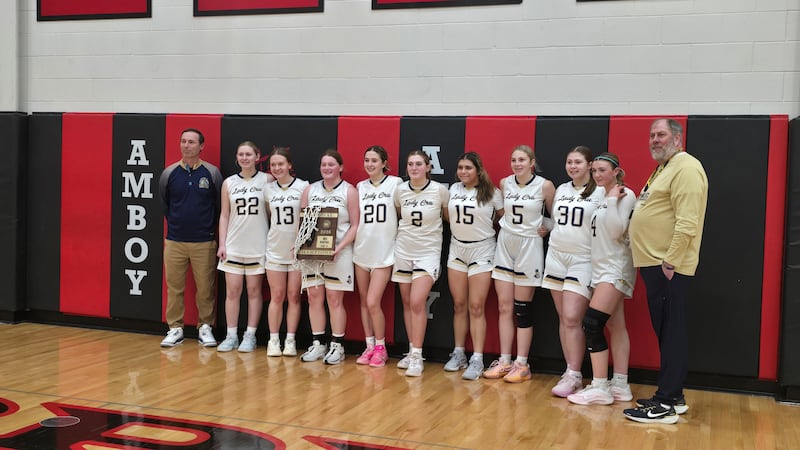 The Marquette girls basketball team is pictured after winning the Class 1A Amboy Regional title by beating Dwight 65-56 on Thursday, Feb. 19, 2026.