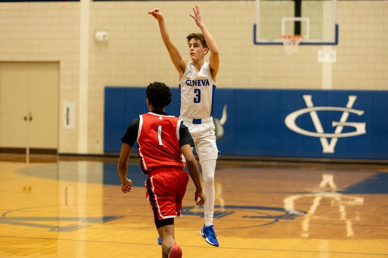 Geneva's Nathan Palmer shoots a three pointer against West Aurora on Monday, Jan. 19,2026 in Geneva.