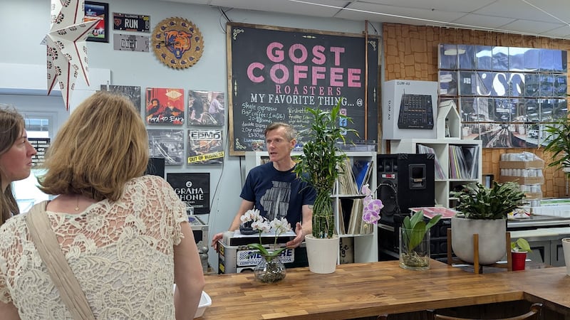 Daniel Bednarz, owner of Gost Coffee in New Lenox, chats to customers on Sunday, April 13, 2025.