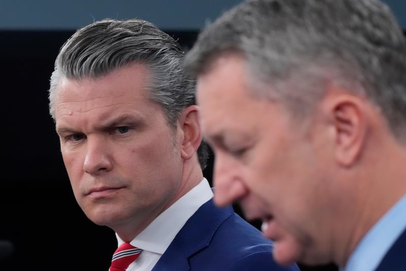 Defense Secretary Pete Hegseth and Chairman of the Joint Chiefs of Staff Gen. Dan Caine speak to members of the media during a press briefing at the Pentagon in Washington, Tuesday, May 5, 2026. (AP Photo/Manuel Balce Ceneta)