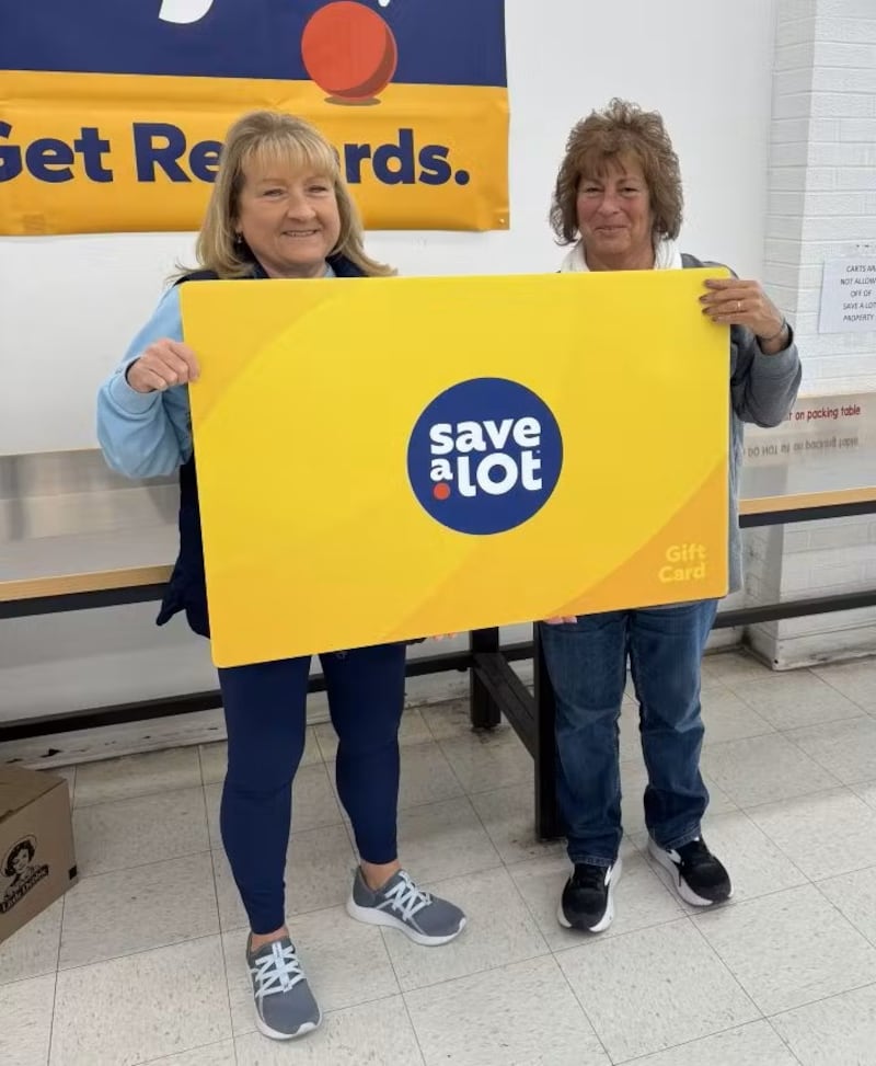 Nancy Siekierka pictured with La Salle Save A Lot Manager Sandy Halberg after being awarded a $250 gift card as a part of the store's national golden sweepstakes campaign.