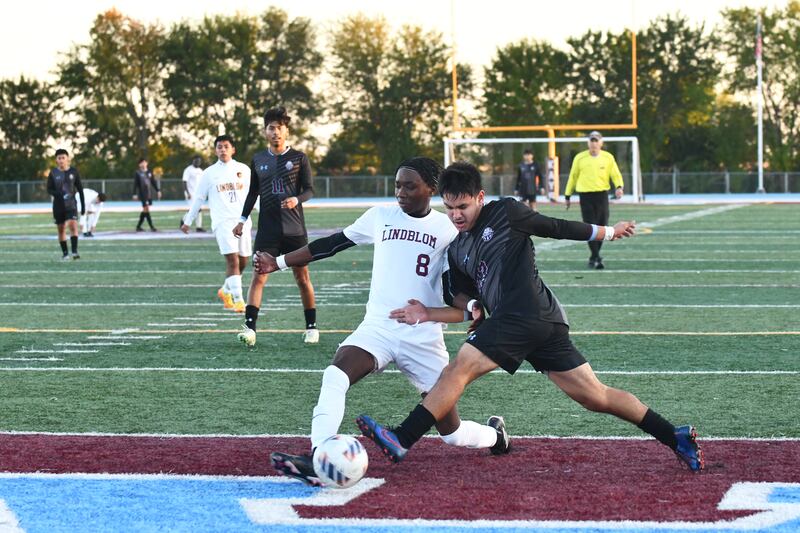Kankakee's Joseph Andrade battles for possession against a Lindblom defender during the Kays' 5-1 victory over Lindblom in the IHSA Class 2A Kankakee Regional semifinal at Kankakee High School on Oct. 17, 2023.