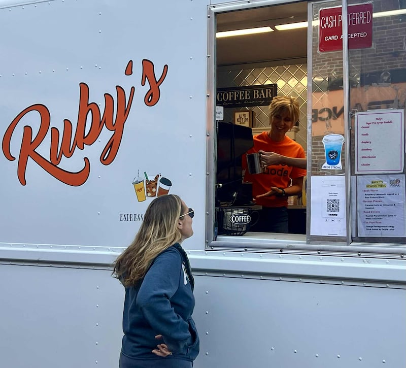 Shelly Kappes, owner of Ruby's Coffee Coach, smiles as she takes a customers order.