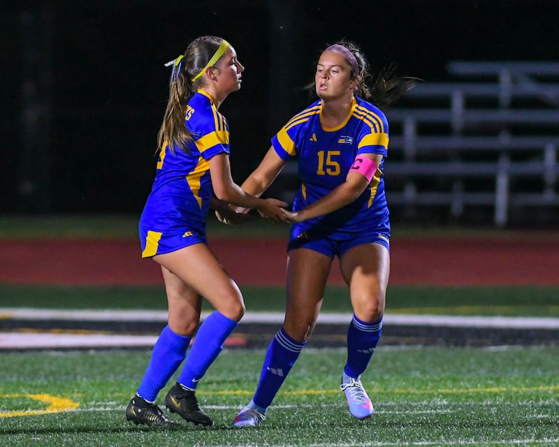 Johnsburg's Dorothy Ruth (13) and Pleasant Plains's Grace Sabatka (22) battle for the ball during the state semifinals game on Thursday June 4, 2026, held at North Central College.