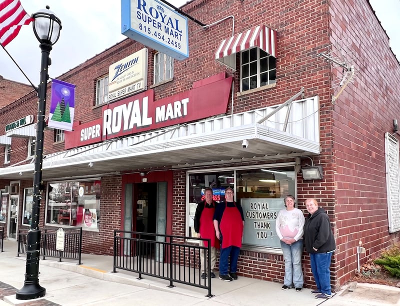 John Winger and Royal Super Mart staff, David Lanham, Patty Gould, and Jackie Burt who will return when the store re-opens summer 2023