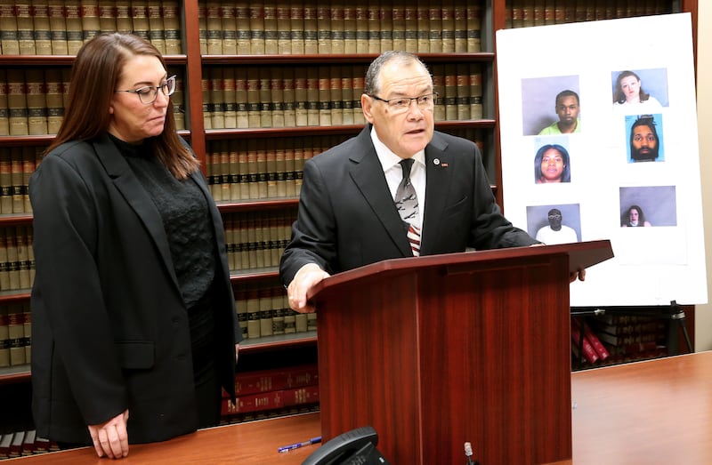 Assistant La Salle County State's Attorney Laura Hall and La Salle County States Attorney Joe Navarro address the media during a press conference on Tuesday, Jan. 7, 2025, at the La Salle County Government Complex in Ottawa. Prosecutors have charged six individuals with felonies for obtaining COVID-19 relief funds under false pretenses. More charges may be forthcoming.