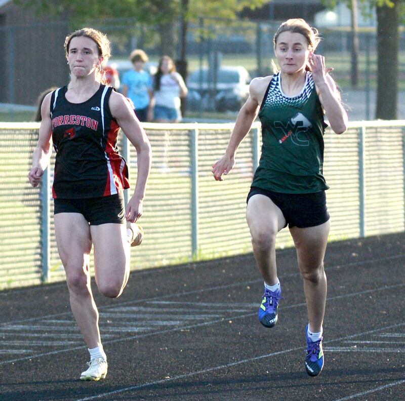 Forreston''s Bree Schneiderman (left) and West Carroll's Emma Randecker race to the finish line in the 100 meters at the 1A Lena-Winslow sectional on Thursday, May 15, 2025. Randecker won the race and Schneiderman was second. Both advanced to the state meet this week at Eastern Illinois University in Charleston.