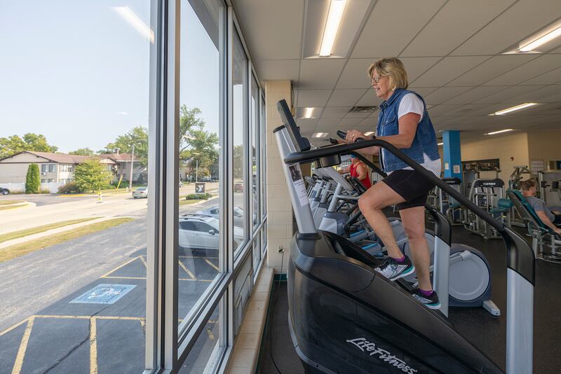 Cheryl Sohn of Dixon uses a stair climbing machine Wednesday, Sept. 11, 2024, at the Dixon YMCA. The Y put forth a challenge to patrons to use the machine to climb 110 flights, the same at the World Trade Center, in recognition of 9/11.