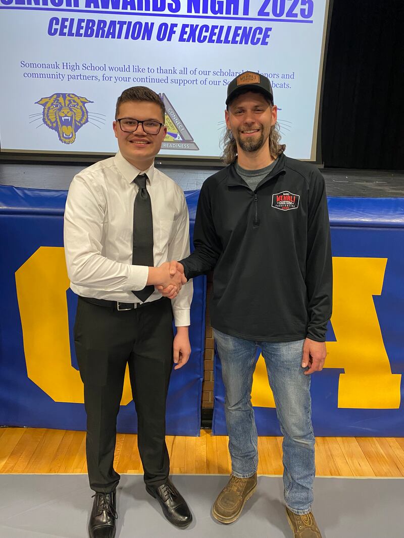 Wehrli Custom Fabrication Scholarship creator Jason Wehrli presenting the 2025 scholarship to recipient Gavin Lorentzen