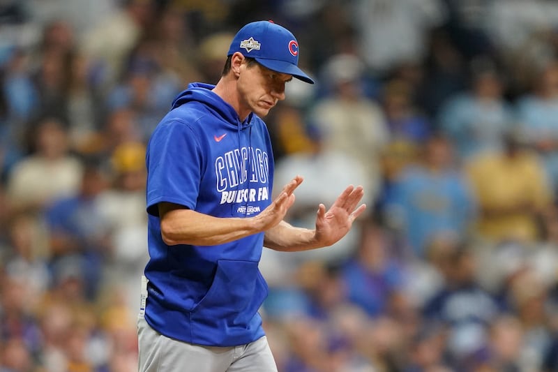 Chicago Cubs manager Craig Counsell comes to the mound to make a pitching change during the third inning of Game 2 of baseball's National League Division Series against the Milwaukee Brewers Monday, Oct. 6, 2025, in Milwaukee. (AP Photo/Kayla Wolf)