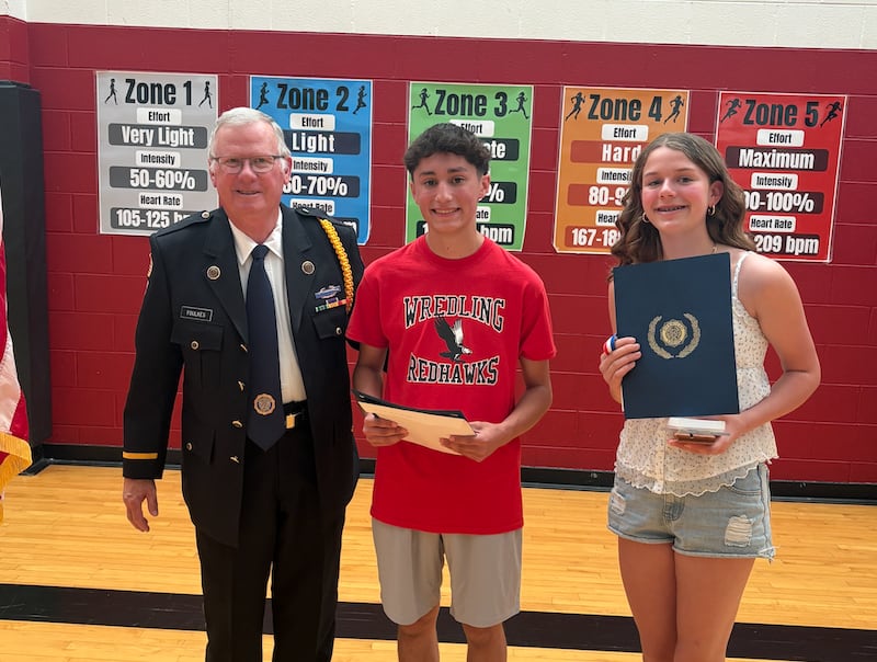The American Legion School Award was presented by Mike Foulkes to Kyle Bashqawi and Courtney Hassman at Wredling Middle School on May 27, 2026.