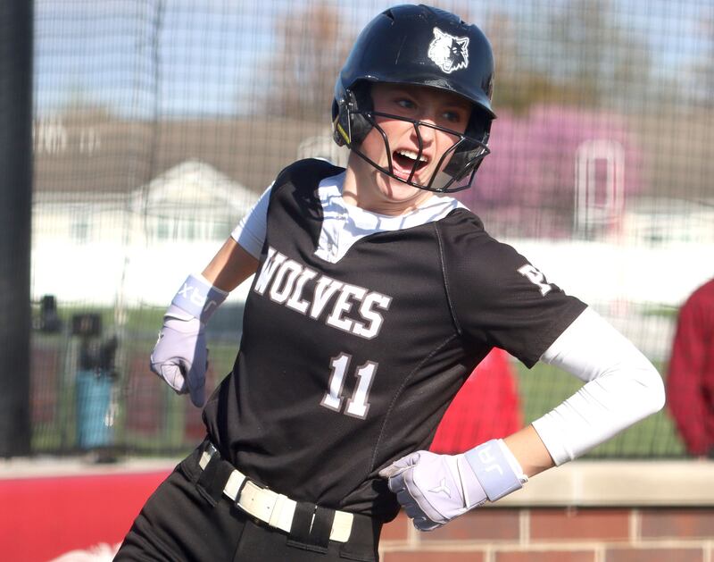 Prairie Ridge’s Kendra Carroll gets revved up after scoring  in varsity softball at Huntley High School in Huntley on Monday, May 5, 2025.