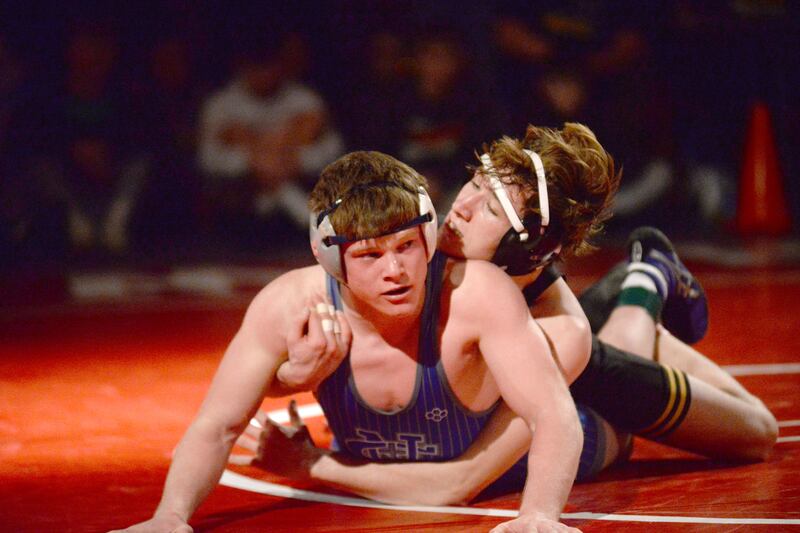 Riverdale’s Blake Smith (top) and Sterling Newman’s Briar Ivey wrestle at 157 pounds in the finals at the 1A Oregon Sectional on Saturday, Feb. 15, 2025.