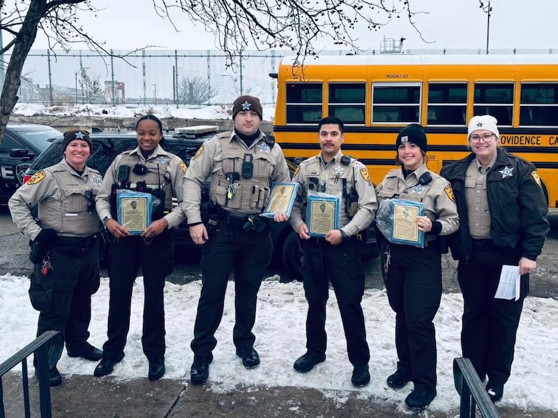Collyn McIlvain (left), vice president of Will County Sheriff’s Office Fraternal Order of Police Lodge #94, stands with Will County sheriff's deputies Kennedy Collins (second from left), Nicholas Kovar, Elijah Lujano, Harley Kessler, and Erin Vascik, the latter of whom is a secretary for the sheriff's FOP lodge.
