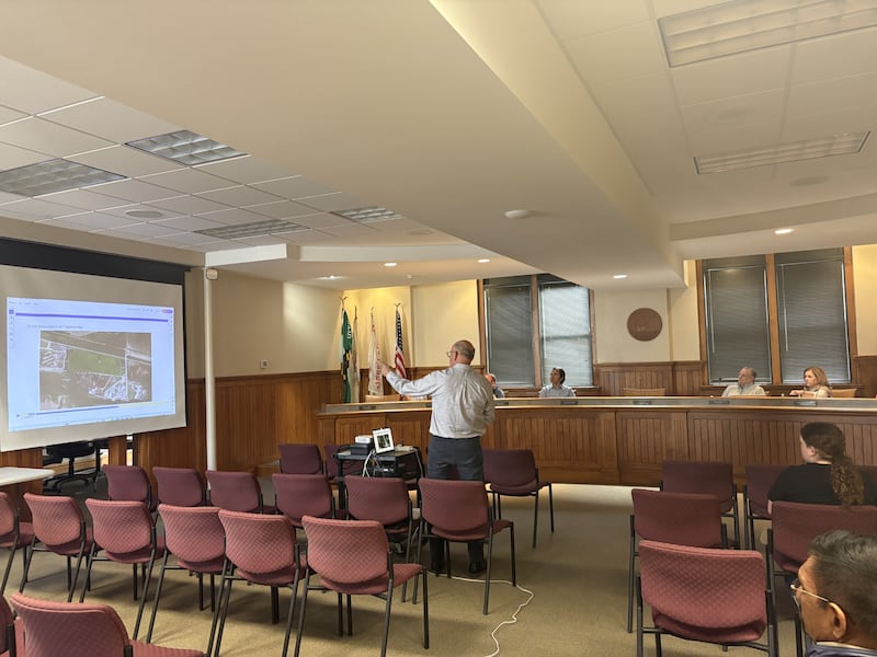 Bill French of SunVest Solar gives a presentation on the proposed solar project to the Ottawa Plan Commission during a public hearing on Tuesday, May 27, 2025, at City Hall.