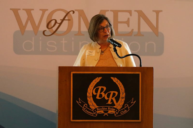 Award recipient Catherine Jones speaks during the Northwest Herald's Women of Distinction award luncheon Wednesday June 4, 2025, at Boulder Ridge Country Club, in Lake in the Hills. The luncheon recognized ten women in the community as Women of Distinction.
