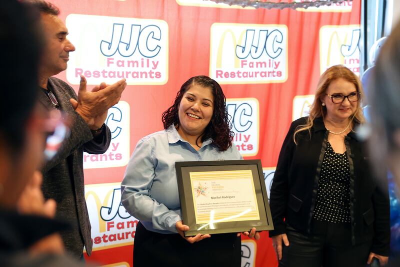 Kankakee resident Maribel Rodriguez, general manager of the North Fifth Avenue McDonald's, is presented with a Ray Kroc Award, a coveted recognition presented to less than 1% of managers across the McDonald’s Corporation, on Tuesday, Oct. 21, 2025.