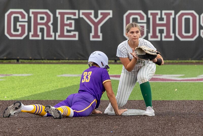 (33) Emily Dormire of Sherrard slides into second base as (7) Maci Kelly of St. Bede awaits pass on Tuesday, May 27, 2025 at Illinois Valley Central High School in Chillicothe.