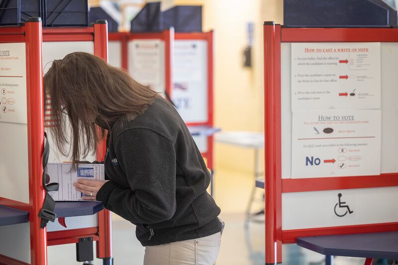 Abbi Gray casts a ballot Tuesday, April 1, 2025, at Northland Mall in Sterling.