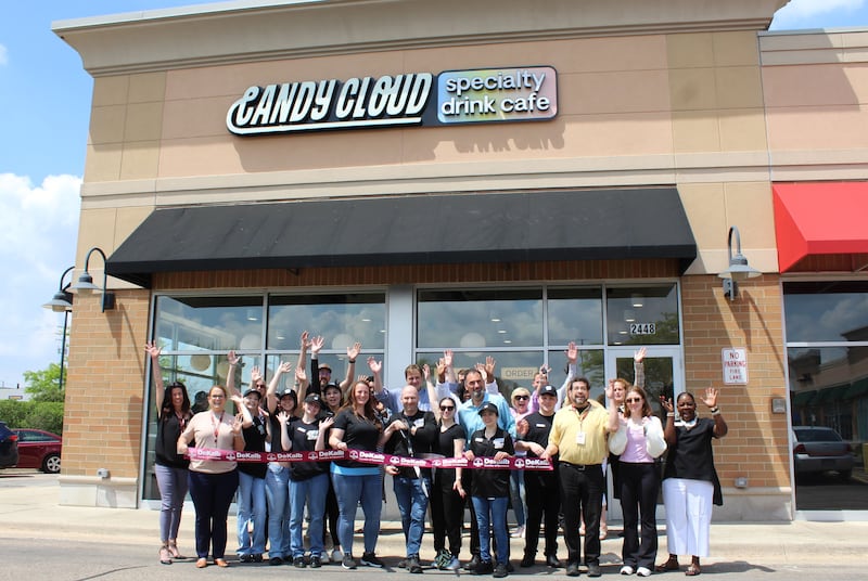 The DeKalb Chamber of Commerce celebrating Candy Cloud's opening