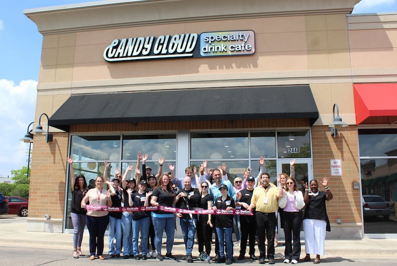 The DeKalb Chamber of Commerce celebrating Candy Cloud's opening