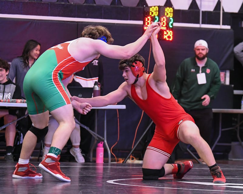 Wes Weatherford, right, of Ottawa takes on Caeden Small of La Salle-Peru during the third-place Bout in the 190-weight class on Saturday Feb. 8, 2025, held at Kaneland High School.