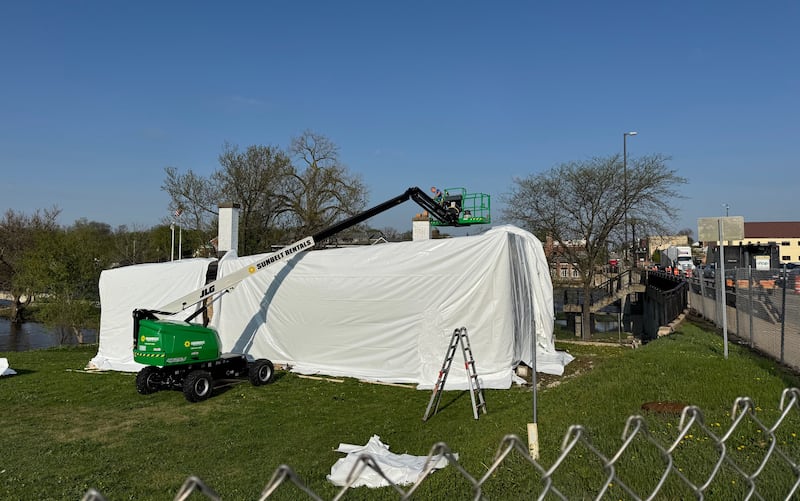 The 1840s remnant limestone blacksmith shop at 4 E. State St. in Geneva is now completely covered in plastic - nearly two years after the city cited it for not putting a tarp on it. Officials are reviewing it to see if the action meets the city's standards.
